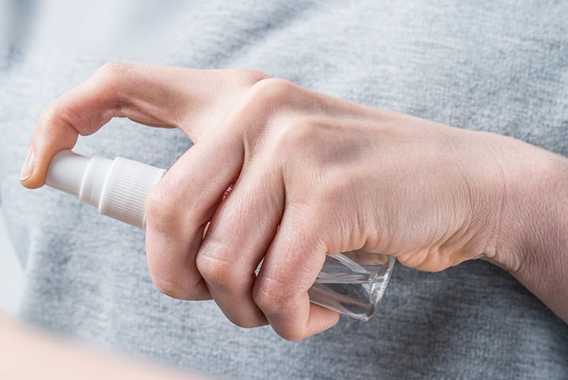 Apply Trojan Extended Pleasure Spray to the Penis