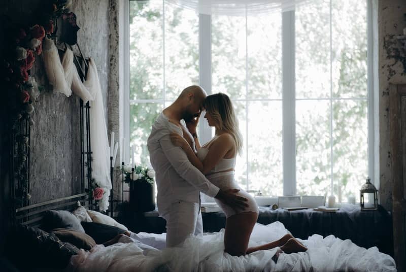 Couple trying something new in bed