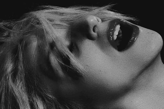 Woman experiencing an orgasm using what she learned from Promescent