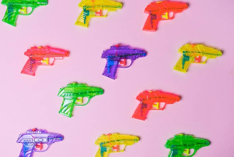 Colorful squirt guns to symbolize female squirting orgasm